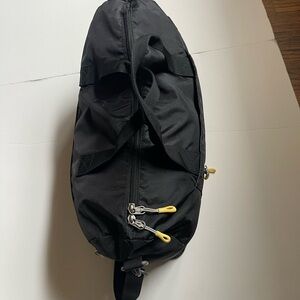 Black Duffel Bag with Sleek Design and Sporty Aesthetic